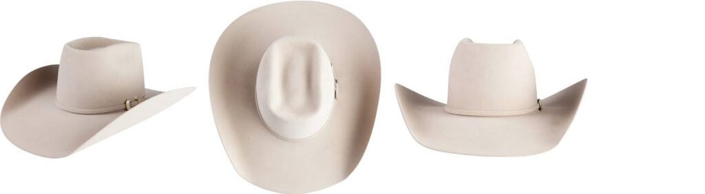El sombrero vaquero de pliegue de ladrillo